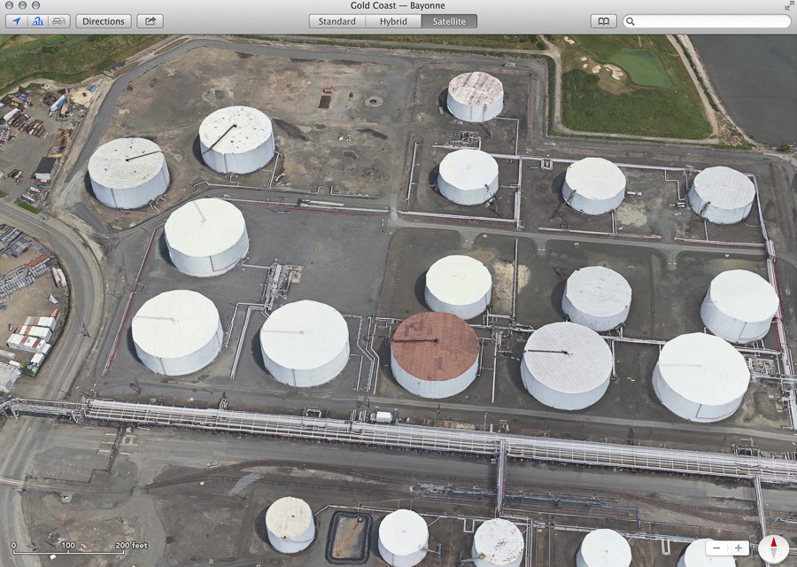 Bayonne tank farm as seen in Apple Maps satellite view, showing tanks as normal cylinder